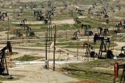 Despite low oil price, Saudi Arabia stays course in opening stock markets