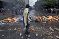 Failed coup diverts attention from Venezuela’s currency devaluation
