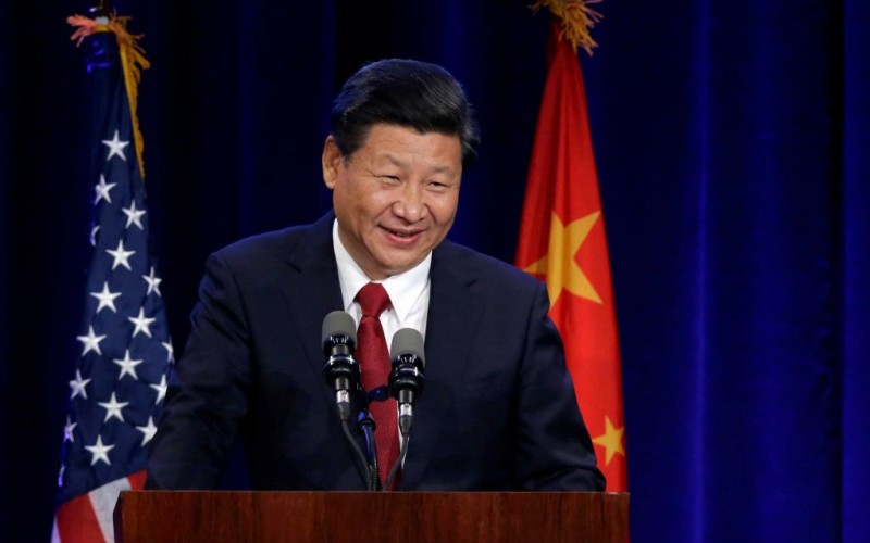 China’s Xi seeks to reassure on cybercrime, stock market