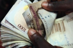 For Nigeria and Angola, the prospect of international loans offers a mixed blessing