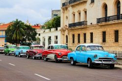 How can US businesses and investors track improvement of the business climate in Cuba?